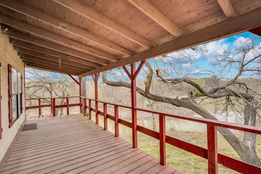 Enjoy peaceful lake views right from your covered balcony at this 2-bedroom, 2-bath home situated on approximately .5 acres. With 1,344 square feet of living space, the layout offers solid potential for a weekend getaway, full-time cabin living, or an investment property. The .5 acre lot provides room to spread out and enjoy the natural setting, while the elevated balcony gives you a front-row seat to relaxing water views. Whether you’re looking to create a cozy rental or a personal retreat, this property offers the location to make it happen. With some vision and renovation, this lake-view property could truly shine making it an ideal project for investors or buyers ready to roll up their sleeves and add value.