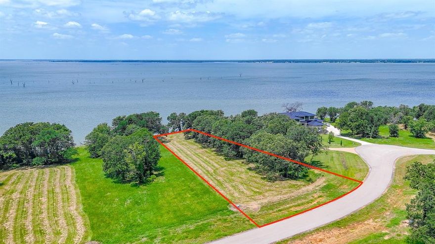 Discover the perfect setting for your custom lakefront retreat on this beautifully situated waterfront lot in the prestigious Admiral Shores subdivision. Nestled on just over an acre, this expansive property offers direct access to the water, breathtaking lake views, and plenty of room to design the home you’ve always envisioned. Located on the shores of Richland Chambers Lake, one of the largest and most scenic lakes in Texas, this lot is ideal for enjoying peaceful mornings, vibrant sunsets, or weekend gatherings by the shore. Whether you're planning to build a weekend escape or a full-time residence, this property combines natural beauty, space, and convenience in one exceptional package. Admiral Shores is a gated community known for its quiet atmosphere, private roads, and quality homes.  The neighborhood offers the perfect balance of privacy and community. Boating, fishing, and water sports are all just steps from your back door, making every day feel like a vacation.