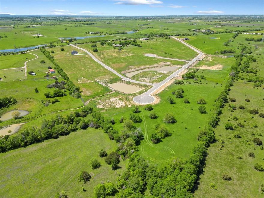 Estate lots from 2 acres and up.  Conveniently located between Godley and Cleburne with easy access to Chisholm Trail.  Architectural approval is required with a minimum of 2,400 sq. ft. for a one-story story and 1,800 sq. ft. minimum on the 1st level of a two-story build.  Stone or Masonry only and side entry garages are required.  No city taxes and served by United Services for electricity and internet.  Each lot will require the installation of a water well.  Pets are limited to 3 domesticated pets with a maximum of two dogs.  The description and pictures are not lot specific.  Applies to the subdivision as a whole.  Development is subject to deed restrictions. Schools are to be verified by the buyer prior to closing.
Lot size source - Final approved plat