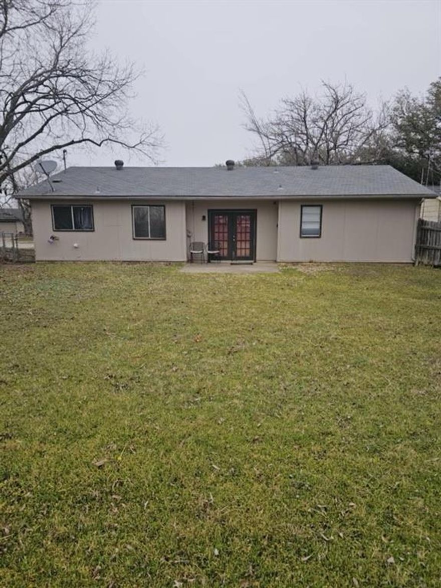 The beautiful home will need a little TLC. The back yard is large enough to add several rooms to this house. This is an Investor dream home.