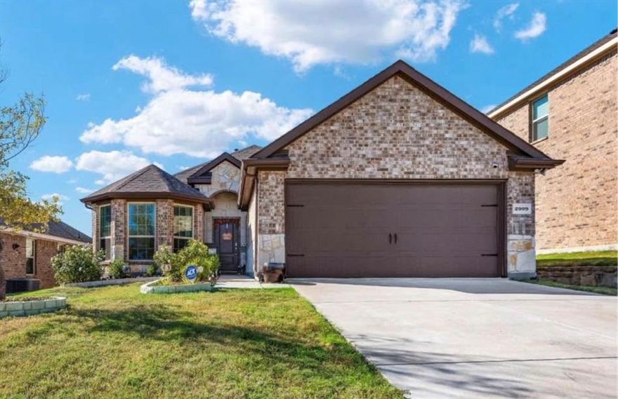 This beautifully designed single-story home offers a bright, open-concept layout with abundant natural light. Built in 2019, it showcases modern upgrades throughout, including laminate flooring and sleek stainless steel appliances. The eat-in kitchen is a true highlight, featuring granite countertops, a stylish herringbone mosaic backsplash, and crisp white cabinetry. The spacious primary suite provides a private retreat with a spa-like en-suite bath, complete with dual vanities and a generous walk-in closet.
Step outside to a backyard designed for both relaxation and entertaining, offering a covered patio and an above-ground ionized pool with ample space to lounge. Residents enjoy access to community amenities including a pool and playground, all within walking distance. Conveniently located just minutes from Little Elm Beach, this home combines comfort, style, and location.