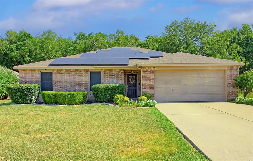 Welcome to this charming single-story brick home in desirable Wellington Park North community. Built in 2008, this well-maintained 3-bedroom, 2- bath residence offers approximately 1,941 sq. ft. of comfortable living space. The open-concept floor-plan features a spacious living room with abundant natural light, a cozy fireplace, and seamless flow into a custom built over sized storage closet. The kitchen is designed with a breakfast bar, ample cabinetry, and easy access for entertaining. The primary suite includes a private bath and generous closet space, while two additional split bedrooms provide flexibility for family, guests, or a home office. Step outside to a fenced backyard with an open patio- perfect for relaxing evenings or weekend gatherings. Additional highlights include a 2- car garage, solar panels. Don't miss out on this great opportunity for a remodeled home. Buyer and buyers agent to verify listing information including, but not limited to schools, square footage. Make this your home.