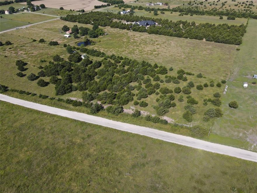 Welcome to the countryside! Lot 7 is a 1.06 acre lot conveniently located right outside of Farmersville. This rural property is a great escape of the hustle and bustle of the big city. A quiet area with plenty of opportunities to build your dream home! Water and electricity is available. Property is outside of city limits so septic system will be required. Multiple lots are available so bring friends and family here!

15% down financing available with a regional bank