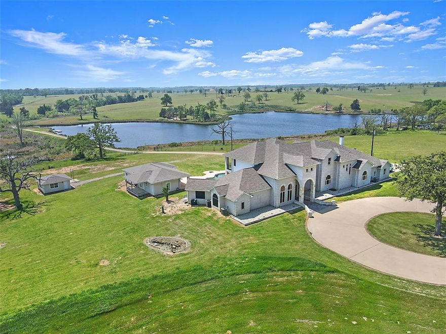 Twin Lakes Ranch offers a truly unique opportunity at a one of a kind private arena in the heart of the Prairies and Lakes region of Texas. The 126 acres sits just 88 miles from Dallas, 152 miles from Houston and 63 miles from Waco. The property is fenced and cross-fenced for horses and livestock. There are two entrances with each having an electric gate. The 6,385 sq. ft. main house boasts of 5 bedrooms, 3 baths and 2 half baths. A custom pool with a 1,275 sq ft 2 bed, 3 bath pool house sits just behind with gorgeous view of Harding Lake. There are also a quaint cottage and a separate guest house with a large shop bringing the total to 12 beds, 10 baths, and 2 half baths. With over 100,000 sq ft of covered area, Big Boy arena is a rare find. It features an elevated announcer's booth, a professional kitchen and eating area, stadium seating, restrooms, a covered walking area, numerous sheds and training areas. The opportunities are endless! Don't miss out on this rare opportunity!