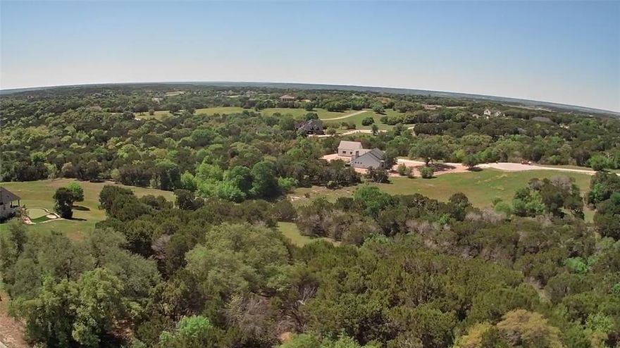 Beautiful one acre greenbelt lot.! This property features some of the best views in The Retreat. Build your forever home and enjoy views of trees and rolling hills from this amazing homesite. The Retreat is a resort community the features a golf course, tennis court, parks, and resort accommodations. Lot is located in a gated community with onsite security. Guard will not allow anyone into the community that is not accompanied by a real estate agent.