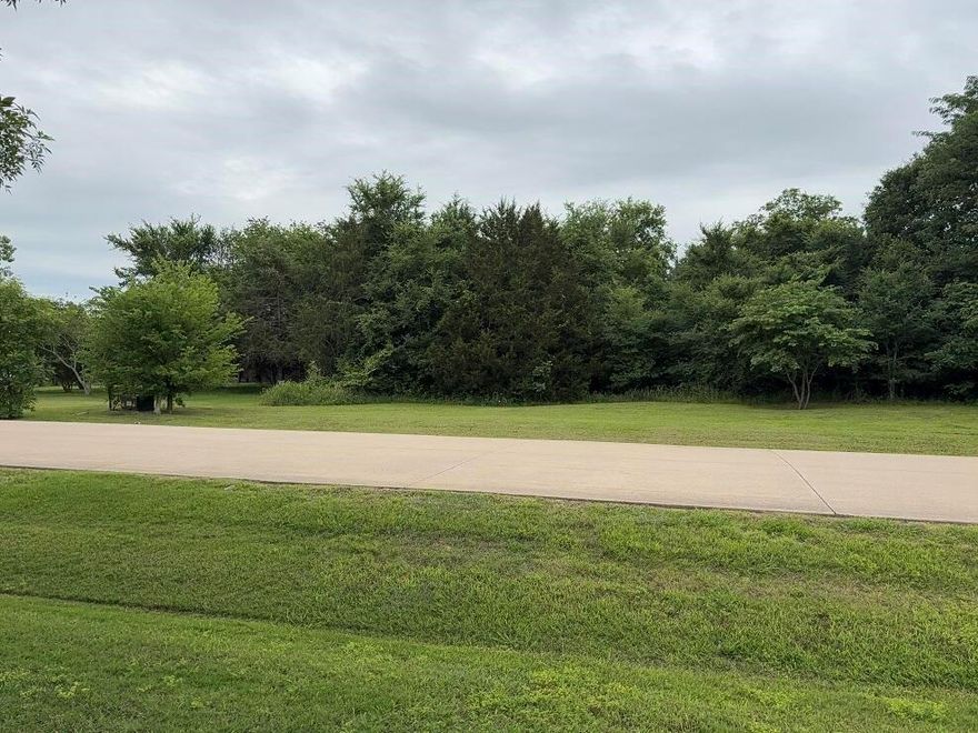 Beautiful 1.8 acre corner homesite in Shadow Lakes Community.  Natural landscape filled with mature trees providing privacy and serene lifestyle in East Texas within a convenient drive to Dallas.  Homesite is across from community pool as well as scenic trails, ponds for fishing  and playground are all accessible to homeowners.