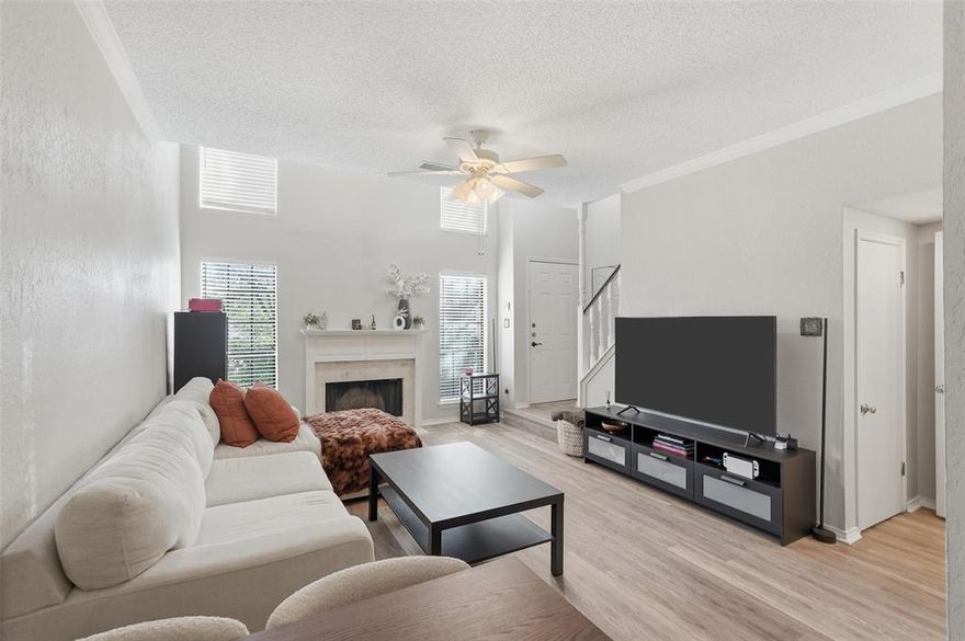 One bedroom + loft area used as a bedroom as well. Light-filled two-story condo located in the gated Preston On The Lake community. The main living area features vaulted ceilings, a cozy wood-burning fireplace, and durable luxury vinyl plank flooring. The kitchen includes granite countertops, ample cabinet space, and opens to the dining area for easy everyday living. Upstairs, the primary suite offers an ensuite bath and walk-in closet. The loft area is currently set up with a bed and works well as a guest space, home office, or flex area. A half bath downstairs adds convenience for guests. Enjoy access to community amenities including a pool, clubhouse, walking and biking trails, greenbelt areas, and a peaceful lake setting. One covered carport space included. HOA covers water, sewer, pest control, and use of community facilities. All of life’s conveniences are just minutes away, with premier shopping at the Galleria, dining in Addison, UTD, and two major airports. Whether you’re seeking a lock-and-leave home base or a serene escape close to everything, this condo offers the perfect blend of comfort living.