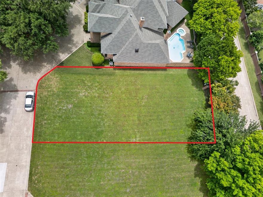 Tucked inside the guard-gated community of Villages of Stonegate, this vacant lot at 2628 Torrey Pines Drive offers a rare opportunity to build a custom home in one of Fort Worth’s most established and sought-after neighborhoods. The homesite is level and cleared, providing a straightforward starting point for construction and allowing you to focus on designing a home that fits your vision from the ground up.
Residents of Stonegate enjoy a private, well-maintained environment with 24-hour guarded entry and a strong sense of community. Neighborhood amenities include a dedicated dog park and convenient access points that make everyday living easy while still feeling tucked away. One of the standout perks is the neighborhood’s proximity to the annual Colonial National Invitation Tournament, offering a unique experience just minutes from your future front door.
The location puts you close to some of Fort Worth’s best lifestyle destinations. Clearfork offers upscale shopping, dining, and entertainment, while the nearby Trinity Trails and Overton Park provide miles of outdoor recreation. Daily convenience is matched by access to highly regarded Tanglewood Elementary School.
Whether you’re planning a primary residence or a long-term investment, this lot combines a prime location, established surroundings, and the flexibility to build exactly what you want. Opportunities like this within a gated community in this part of Fort Worth are limited, making it a strong option for buyers ready to bring their plans to life.
