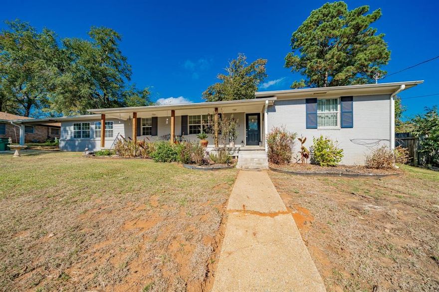 Located in Palestine on a 0.47-acre lot, this 2,450 sq ft home welcomes you with a cozy living room centered around a warm fireplace and natural light, flowing seamlessly into a dining room designed for hosting and gathering. The kitchen offers generous cabinetry, abundant storage, stainless appliances, a breakfast bar for busy mornings, and plenty of counterspace that keeps everything within easy reach. The open floorplan, dining area, and dedicated laundry room make daily living smooth and comfortable. The ensuite primary bedroom features a spacious walk-in closet built for organization and a refreshed 2024 bathroom with new paint, regrout, and mirrors. All bedrooms are well-sized and accommodating. Valuable upgrades include a tankless water heater, 2021 electrical outlet updates, electricity run to the carport, an added shed, and 2023 landscaping along with a railroad-tie retaining wall, French drain, and new front gutters. Outside, the expansive backyard offers shade trees, two storage sheds, and excellent usability thanks to the thoughtful drainage improvements. Negotiable items include the living room couch, loveseat, and coffee table; the dining table, chairs, and buffet; and the primary bedroom headboard and footboard. With meaningful updates, storage throughout, and inviting indoor-outdoor appeal, this property delivers the move-in-ready comfort buyers are looking for in Palestine. Conveniently located near local shops, dining, and schools, this home captures the quiet charm and welcoming spirit of Palestine. Palestine offers small-town charm with historic architecture, tree-lined streets, and a relaxed East Texas lifestyle surrounded by rolling hills and beautiful countryside. Proudly Claim Your Piece of Texas!