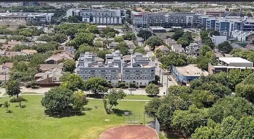 Stunning 2 Bedroom 2.5 Bath townhome in the heart of East uptown Dallas, offers breathtaking views of the Dallas skyline from the huge 700 sq foot rooftop deck. Spiral stairs to 4th fl roof deck, patio and outdoor living area. Along with an enclosed Media Entertainment room with TV on rooftop.
3rd fl expansive master suite ,coffee bar, balcony that overlooks Exhall Park, & bonus office space. Full-size W & D hook ups in utility area, large walk-in closet.HUGE ensuite with double vanity, soaking tub, separate tile shower with designer crown molding & Travertine tile.
Updated guest bathroom & powder bath. 
2nd fl Open kitchen & living room with hardwood, granite, breakfast bar, stainless appliances & half bath.
 4 blocks from Deep Ellum & just a few miles from Lower Greenville. Walking distance to shops, restaurants & bars -near Baylor hospital
Exhall Park - Rec Center across the street with a Gym and Yoga classes
 Updated exterior Nov 2022