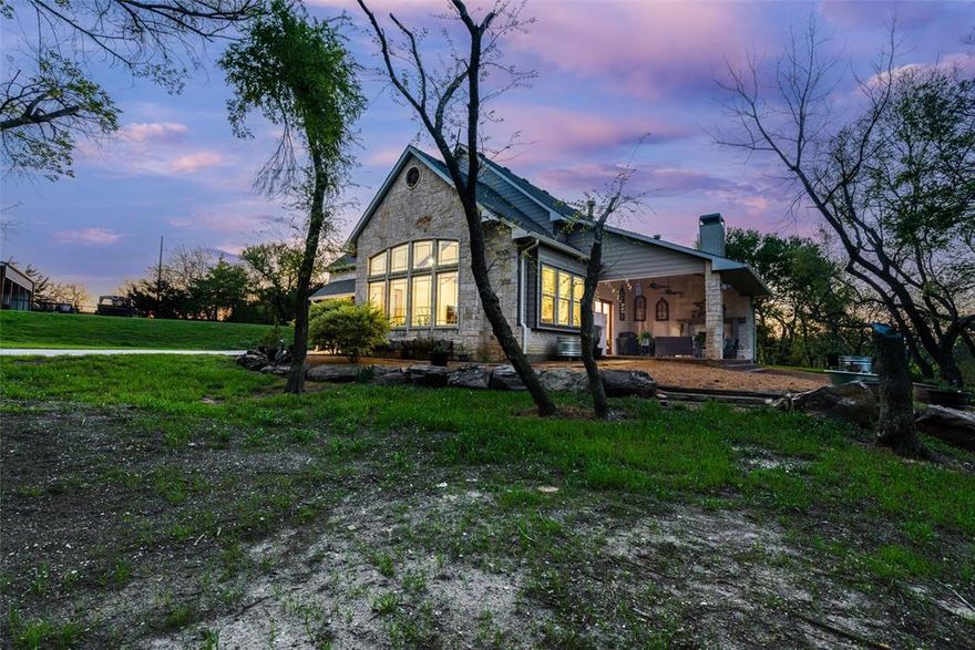 Exquisite 10 Acre Estate with Private Lake Access w 668 feet of water front & Stunning Upgrades in this Custom Built home. Welcome to a breathtaking 10 acre estate that seamlessly blends luxury, comfort  & country living. Nestled against a serene 35-acre lake, this move-in-ready 4,100+ sq. ft. home offers unparalleled views, modern updates & exceptional outdoor amenities.As you step inside, you're welcomed by a grand living room featuring exposed beams & a magnificent fireplace, all set against a backdrop of panoramic views of the land and lake. The gourmet kitchen, complete w its own fireplace, updated appliances, and a massive pantry with a separate utility pantry, is a chef’s dream.The fabulous first-floor primary suite boasts a luxurious en-suite bath and two large walk-in closets. An additional first-floor bedroom provides convenience, while two spacious secondary bedrooms upstairs offer ample room for family & guests. Property Highlights: Scenic & Spacious Land  A mix of cleared pastures and mature trees, fully fenced for privacy, horses, or cattle. Lakefront Lifestyle Fish in your backyard, enjoy a boat ride, or simply relax by the water.Outdoor Entertaining – Unwind on the fireplace-covered porch, the perfect spot to watch the sunrise or bask in the moonlight. Expansive Storage & Workspace  A 40' x 52' covered building provides space for parking, equipment, and storage. Hobby Farm Potential, A chicken coop and workshop with electricity and AC make this property ideal for self-sufficiency.Rifle & Shooting Range A rare feature for outdoor sports enthusiasts. Recent Upgrades: New roof & gutters, windows, HVAC systems, exterior paint, and designer interior paint give this home a fresh, modern feel. Enjoy the peace and privacy of country living while staying close to essential amenities. A rare opportunity like this doesn’t come along often! Experience the beauty of nature, the charm of an updated home& the luxury of lakeside living, in one extraordinary estate.