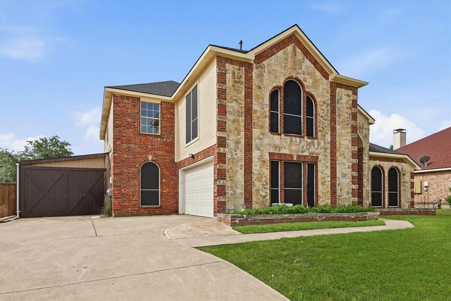 Welcome to your next American Dream home in desirable Sachse On The Creek Phase 2, a well-established community with convenient access to shopping, dining, and highly regarded schools. This stunning home is designed for both comfortable living and entertaining, offering a spacious layout ideal for large families.
The beautiful stone and brick exterior is complemented by a large driveway and side-entry two-car garage. Step inside to an impressive foyer with vaulted ceilings and an open-concept floorplan filled with natural light throughout the first floor. The formal dining area flows seamlessly into a chef-inspired kitchen featuring abundant cabinetry, dual sinks, granite countertops, and an open bar overlooking the living room.
The inviting living area showcases a stacked stone decorative fireplace and views of the backyard and pool. The oversized primary suite offers pool views, a striking 3D accent wall, space for a sitting area or office, and a massive walk-in closet.
Upstairs features four generously sized bedrooms, including a Jack-and-Jill layout, plus two additional rooms with attached full bathrooms, providing ample space and privacy.
Step outside to your private backyard retreat complete with a covered patio, pergola, and heated pool—perfect for year-round enjoyment. Additional highlights include dedicated gym and sauna rooms.
Located in a sought-after community with easy access to major highways, parks, and everyday conveniences, this home blends space, style, and lifestyle into one exceptional opportunity.