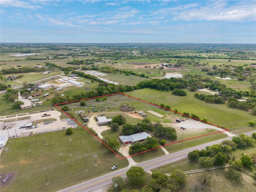 Location, Location, Location, Great Location right on Hwy 281 just south of the Hwy 281-67 intersection. Walking distance to Hard 8 BBQ. Tons of Opportunity for this 7.8 acres just outside of City Limits. Currently the home has been used as a Rental bringing in $2500 per mo. This Home is move in ready or with a little TLC it could be a spectacular show place again. A great Residential or Commercial property. The Shop could easily be rented out for $1500+ per month. It is currently their construction office. Still leaving lots of land to enjoy or put to work. Don't hesitate to see what can be done with this property. Schedule your showing today.