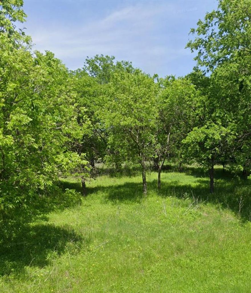 Discover the perfect setting to build your dream home on this spacious 0.774-acre vacant lot. Located in a growing community with new homes under construction, this property offers the ideal balance of peaceful country living and convenient access to city amenities. Enjoy the freedom of no HOA restrictions, giving you the flexibility to design and create the home you’ve always envisioned. This property is located in an unincorporated area of Tarrant County. Because it is outside the city limits, Tarrant County does not enforce zoning regulations in this area. With mature trees and plenty of open space, the lot provides a beautiful natural backdrop for your custom build. Just minutes from Benbrook Lake, parks, and outdoor recreation, you’ll also be less than 10 minutes from shopping and dining in Benbrook. Plus, with easy access to US-377 and I-20, commuting to Fort Worth or nearby areas is simple and convenient. This is a rare opportunity to secure a large homesite in the highly sought-after Aledo ISD—don’t miss it!