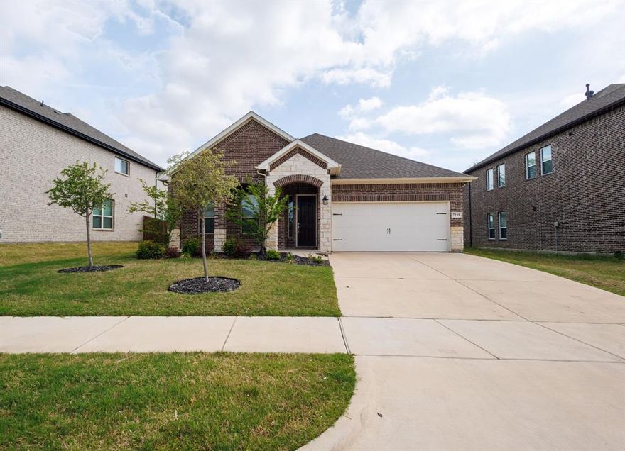 Stately home in a family-friendly neighborhood, zoned to award-winning Mansfield ISD. Thoughtfully designed open-concept layout featuring a private study, a stylish kitchen with built-in cabinets, quartz countertops, and a gas cooktop, all flowing seamlessly into a light-filled family room.
The serene primary suite is tucked away at the rear of the home and offers a spa-inspired bath with dual vanities. A guest suite with a full bath provides exceptional flexibility for visitors or multigenerational living, all conveniently situated on one level.
Step outside to a covered patio overlooking a private backyard—perfect for relaxing mornings or evening gatherings. Ideally located with convenient access to major thoroughfares, upscale shopping, dining, and nearby recreation.
