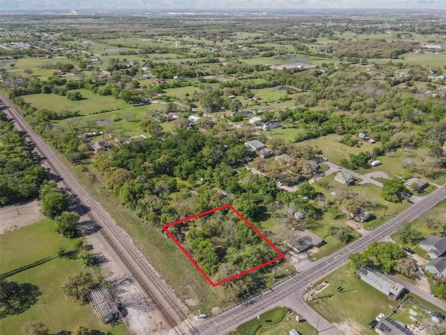 Rare Double-Access Lot in the Heart of Joshua! Now offering a combined .32-acre homesite featuring dual street access from both 102 Carlock Street and 201 W 14th Street—a unique setup that provides convenience, flexibility, and added value. Tucked away in a quiet neighborhood, this clean and open lot blends small-town charm with everyday ease. Whether you're ready to build a cozy homestead or looking for your next investment, this property is ideally located just minutes from Joshua High School, city parks, and the shops and eateries of Old Town Joshua. Quick access to Hwy 174 and Chisholm Trail Parkway makes commuting to Burleson, Fort Worth, and surrounding areas a breeze. Utilities are nearby, and the lot is cleared and ready for your vision. Come walk the property and see how this little slice of Texas could be the start of something special.