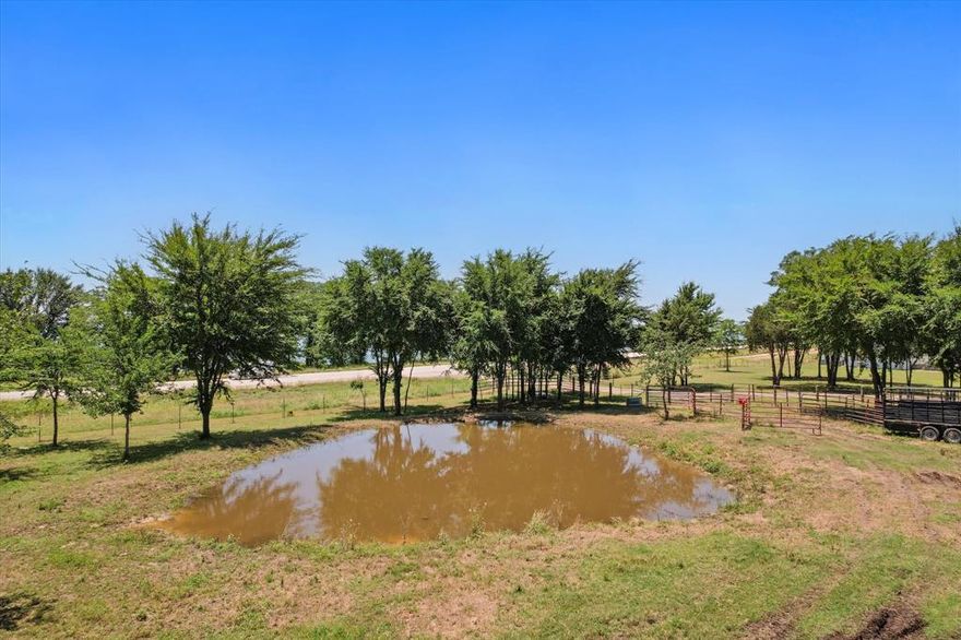 EXCEPTIONAL OPPORTUNITY with FLEXIBLE PURCHASE OPTIONS on this versatile Texas ranch just feet away from the BEAUTIFUL Richland-Chambers Reservoir. This property may be purchased on its own, or combined with the stunning lakefront home and an additional 4.65 acres (MLS# 20638562) to create an extraordinary estate. Currently AG-exempt and home to a thriving Longhorn herd, the land is beautifully treed, fully fenced, and features a serene stock pond. With frontage on US Highway 287, the property offers excellent ACCESSIBILITY and HIGH VISIBILITY—ideal for a future business venture, short-term rental cabins, RV accommodations, or continuing agricultural use. Whether you're seeking a private ranch retreat, income-producing investment, or the perfect place to build, this property delivers endless possibilities.