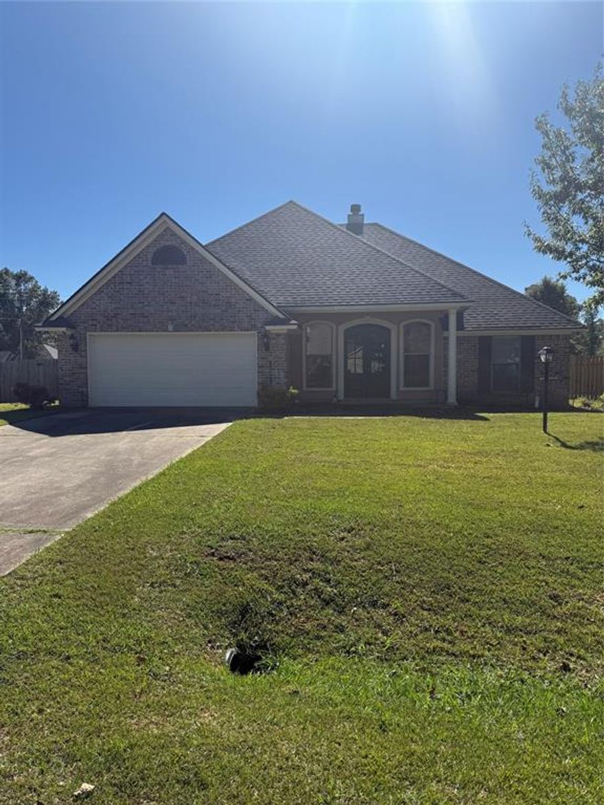 Welcome to this beautifully maintained home offering timeless charm and a functional layout! The inviting exterior features brick accents and a welcoming front porch. Inside, you’ll find spacious living areas with crown molding, wood-look flooring, and plenty of natural light. The kitchen offers abundant cabinet storage, a center island, and a breakfast nook overlooking the backyard. A separate formal dining room provides the perfect space for gatherings. The primary suite includes a large bedroom, dual vanities, and cultured marble countertops in the bath. Outside, enjoy the expansive fenced backyard. This home combines comfort, convenience, and charm in one perfect package!