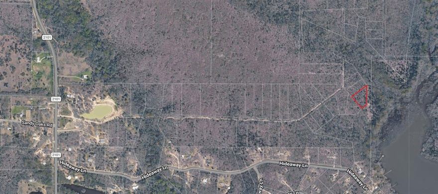 Heavily treed lot in a very secluded location with frontage on a cove of Lake Tawakoni. Located approximately a mile off FM 2101, this property offers a rustic location for outdoor activities. This property is accessible via an unimproved road. There are no utilities available.