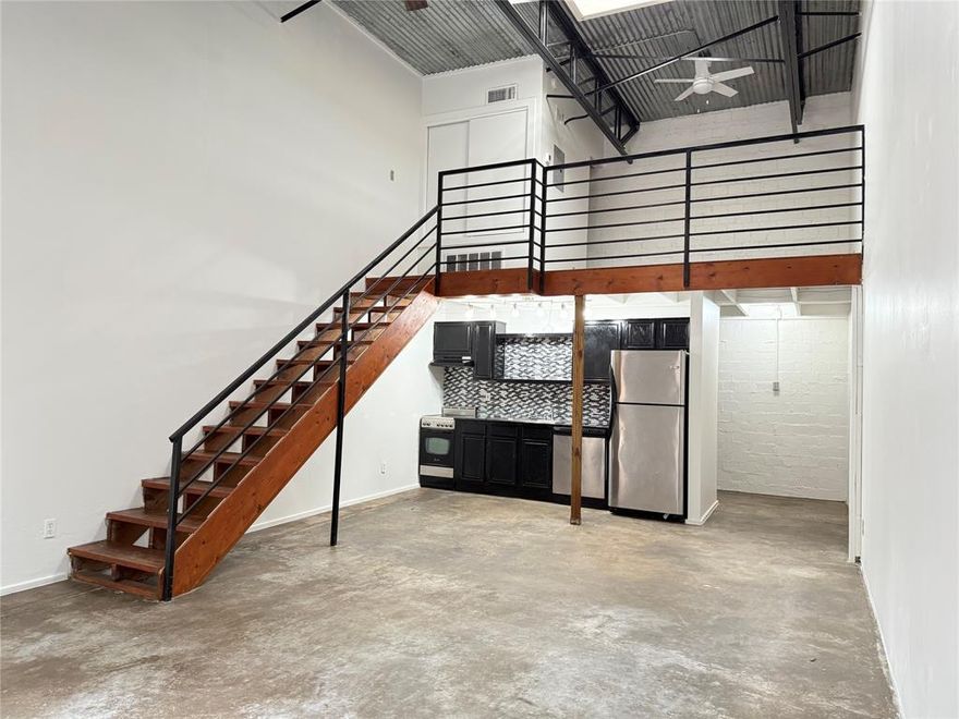Industrial style loft in the heart of Dallas.  Open floorplan with concrete flooring and exposed ductwork.  Everything but the bedroom and closet is downstairs.  Perfect for living and working. Building is gated and shared with only 6 other tenants. Close to nightlife, restaurants and entertainment. NO SMOKING.LAUNDRY FACILITY ONSITE. NO PETS. Comes with one covered parking space. Please submit application with drivers license and copy of two most recent pay stubs.