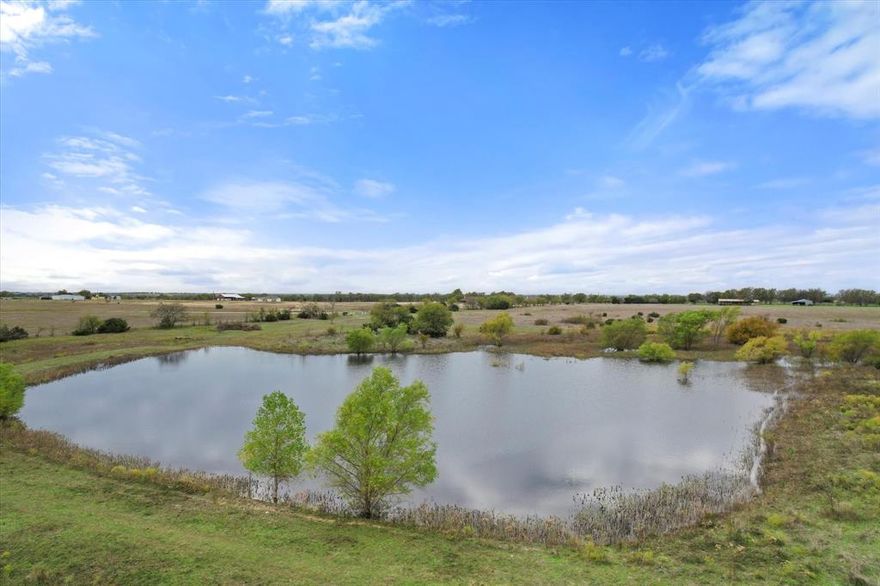 This is a rare opportunity to own 71 acres of vacant land in Cleburne with great potential for development due to a large amount of road frontage. Whether you envision a residential community, recreational facility, or a single-family home with livestock, the possibilities are vast! The property
features a shelter barn with working pens & two beautiful ponds providing opportunities for water-related activities. Currently, the land is utilized for agricultural purposes, leased for cattle. The existing agricultural lease can be terminated. A one-acre portion of the land is zoned for residential use. The property already has electricity supplied by United Cooperative Services (UCS) - high-speed fiber optic internet service is available at this site as well from UCS. A septic tank & water is connected-provided by Johnson County SUD. Contact us today to schedule a viewing & explore the possibilities!