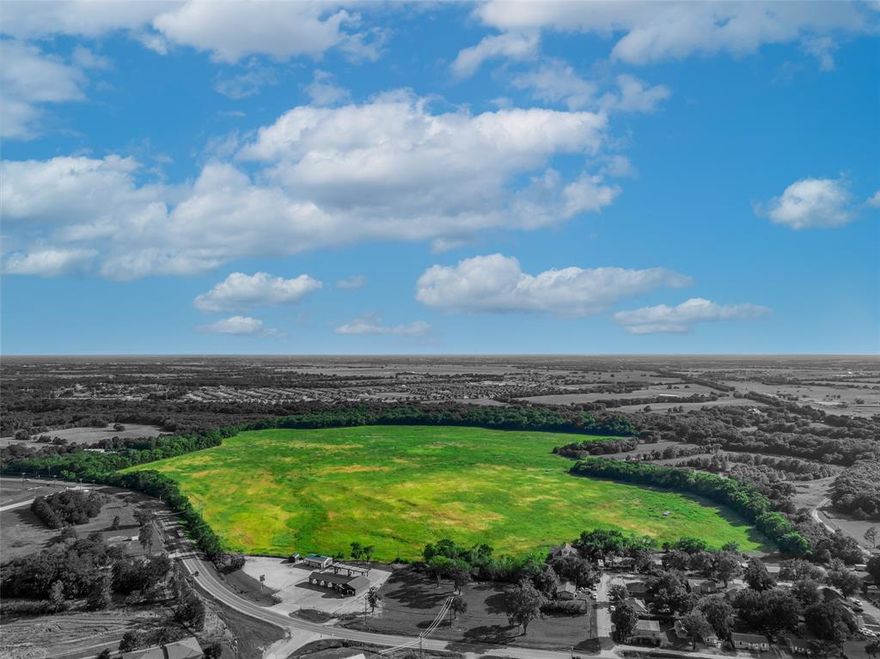 This 103-acre tract is located on FM 36 in Caddo Mills, TX. The property offers a prime location directly across from Caddo Mills High School, one mile from State Highway 66, one mile from Downtown Caddo Mills, and three miles from Interstate 30. Zoned Agriculture, the site is a high-grade development opportunity for mixed-use retail or residential. With all utilities to the site, and over 1,700 feet of frontage, the property is ready for buildout in a fast-growing community.