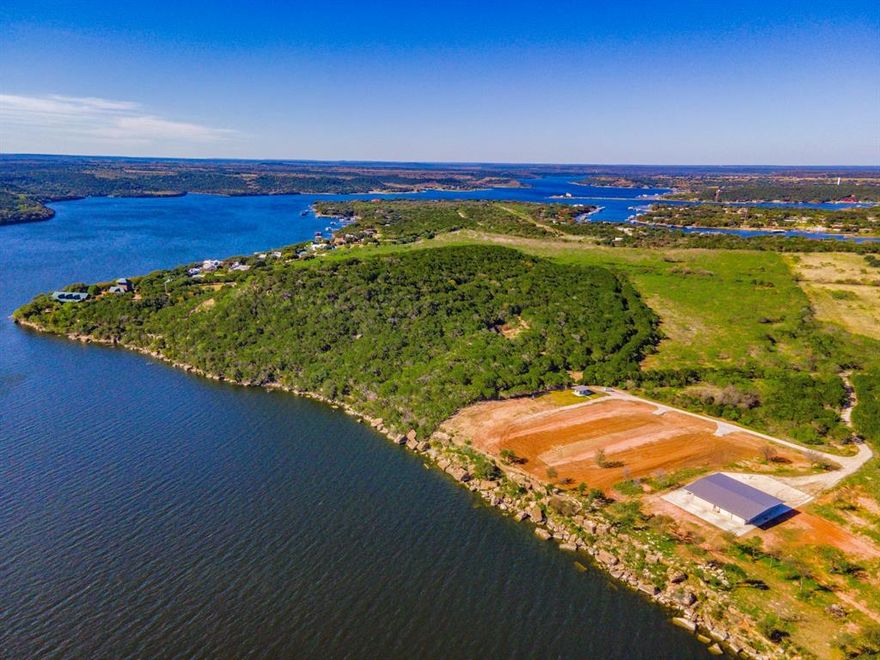 PRIME WATERFRONT, DEEP WATER, DOCKABLE Possum Kingdom Lake LOTS, with PANORAMIC, SPECTACULAR, ELEVATED VIEWS on the West Side of PK. There are 3 Lots available. This Listing is for Lots 23-C&D, with 1.75Acres and 100' of Water Frontage each. Level and Ready to Build your dream PK Lake Home and Custom Dock. These Lots sit just across from the Peninsula of PK with its many restaurants & amenities, and are conveniently located to the Breakers Marina just next door for Gas, Ship Store Conveniences, Slip Rentals and Boat Ramp use, and Fox and Possum Hollow Restaurants  just minutes away by both car and boat, and the Famous Hell's Gate is only a short beautiful boat ride away as well. They are also located an easy 20 minute drive to the small charming town of Graham, for Walmart and Grocery store shopping, great dining options and fabulous boutique shopping as well. There is a PK Water Meters already installed and just require a Septic System designed to fit the needs of your Custom Build.