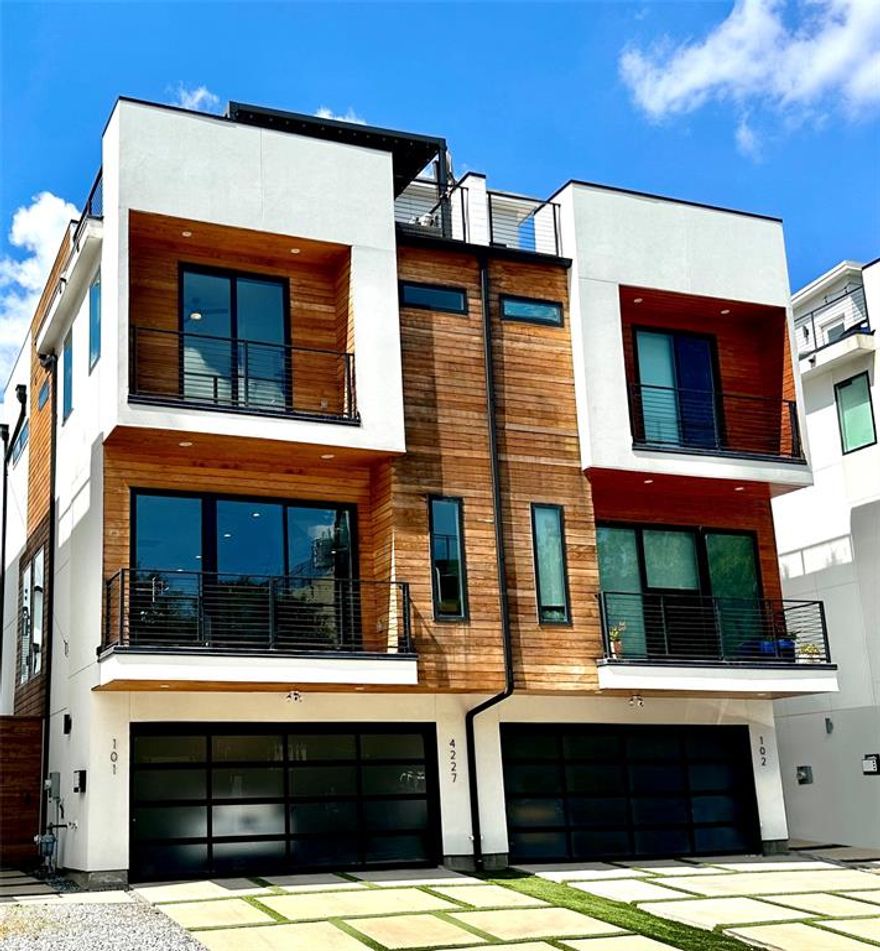 Stunning Contemporary Single Family Attached property in East Village w-NO HOA dues and only 1 shared wall! Completed in 2020, this 3 story home with gated entry, large rooftop patio, and 20x9 turfed backyard is the epitome of modern living. The well thought out floorplan which lends its self to easy living and entertaining includes 3 full beds with ensuite baths, a half bath, an open living and dining concept with windows throughout allowing for lots of natural light. The 2 car garage has some extra height for larger vehicles specifically trucks. The rooftop convertible covered living area with attached fan provides shade from sun and a tv for entertainment. Additional home features include real hardwoods, Quartz countertops w-waterfall edge kitchen island, gas range w-vent to exterior, under cabinet lighting at counter & floor level in kitchen, modern and timeless tile choices throughout kitchen & baths, including kitchen backsplash, utility room on 3rd floor near primary & bedroom2, rooftop storage closet, metal roof, tiled roof top patio spaces, hardie plank siding & much more. ! Foodies rejoice, Loro & EBar at end of the block along with so many more food and coffee options within the neighborhood including the expansive commercial development at The Central. Fantastic East Dallas Location amongst lots of new and to be built construction! Get in NOW to this HOT Part of Dallas!