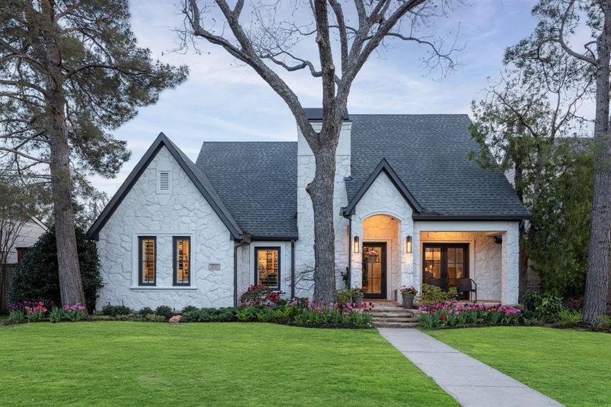 Tucked beneath mature trees in the heart of Devonshire, 5530 Bryn Mawr feels like it’s been lifted straight from the pages of a storybook. This beautifully reimagined two-story home showcases the timeless charm of Austin stone, blending old-world character with the ease of modern living. A primary suite on the first floor offers a peaceful retreat, while original  hardwood floors carry you through the downstairs living spaces, where rich natural materials add warmth and texture. Custom cabinetry and intricate millwork lend a sense of craftsmanship and charm, while two thoughtfully designed fireplaces create inviting spaces to gather and unwind. Upstairs, two spacious bedrooms each feature a full bath, offering comfort and privacy for family or guests, and a built-in office adds a functional, stylish workspace. Situated on an expansive 67x148 lot, the property offers a rare sense of space in this coveted neighborhood. Newly designed landscaping enhances the picturesque setting, while a brand-new fence adds privacy and a polished finishing touch. Just beyond your door, enjoy the charm and convenience of strolling to Inwood Village for coffee, dining, and everyday essentials—completing the storybook lifestyle this exceptional home provides.