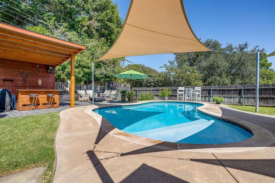 Best value in Ridgmar under $800k, rare pool + detached climate controlled shop + EV ready garage. This home blends indoor comfort with expansive outdoor living, creating the ideal setting for both lively gatherings and laid-back weekends.

Step outside and experience a backyard designed for connection and relaxation. Lush landscaping surrounds an open lawn—perfect for casual games, poolside lounging, or unwinding in the Texas breeze. The spacious covered patio offers shade from the sun and protection from light rain, making it easy to host everything from brunches to evening get-togethers year-round.

Large glass doors seamlessly connect the living and dining areas to the patio, creating a true indoor-outdoor flow. Whether you’re entertaining guests or enjoying a quiet night, the layout keeps everyone connected.

Additional features include:
• 220V available in the garage for convenient EV charging
• Attached two-car garage
• Detached 16’ x 24’ climate-controlled shop—ideal for hobbies, storage, or a workspace
• In ground salt-water pool
• 14' x 20' all season climate controlled sunporch
• Fresh Paint
• New HVAC
• New windows
• Upgraded Insulation

Inside, the open-concept design continues with a bright living area, and updated kitchen overlooking the backyard, and comfortable bedrooms that offer a peaceful retreat.