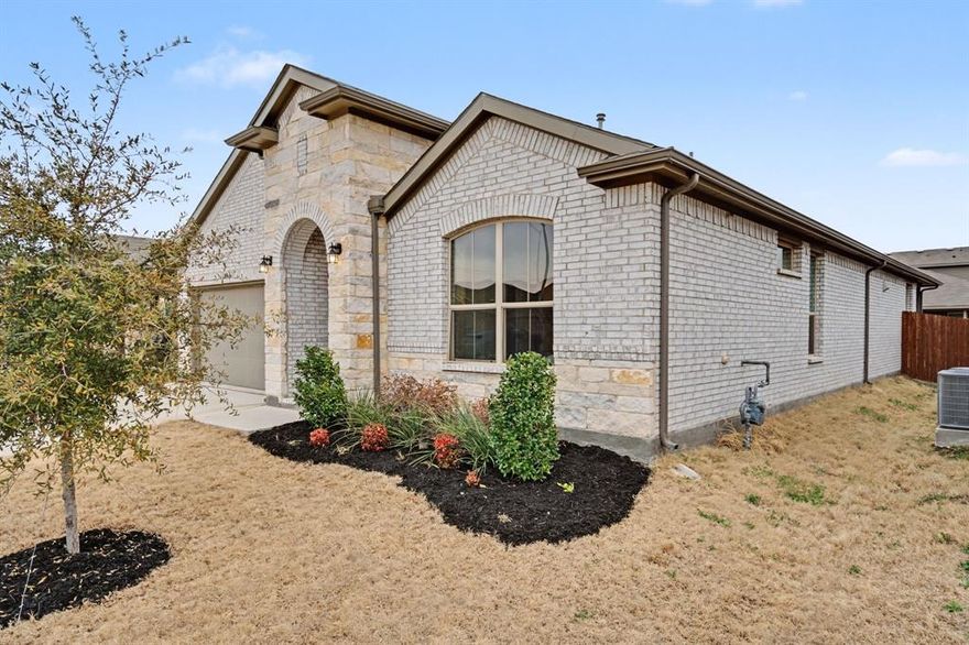 MOVE IN READY !!! SELLERS WILL LEAVE FRIDGE, AND WASHER AND DRYER.  BETTER THAN NEW !!  Welcome to The Trails of Elizabeth Creek where family fun meets resort style living. The pool, lazy river and playgrounds are second to none. Come relax at the pool and soak up the soon to be summer sunshine. This property boasts a wonderful gourmet kitchen with a very large island. The island measures 8.5 feet long and 3.6 feet wide and accommodates 4 bar stools. The countertops are gorgeous white quartz with a hint of sparkle giving it a very upscale feeling, like quiet luxury.  The chef in you will appreciate the 4 burner gas cooktop and the extensive counter space including a buffet serving area and a coffee and tea bar in the kitchen.
The owners have meticulously maintained their home and it shows better than new. The tankless water system is a great upgrade 
This home has the Hatfield elementary school located within the neighborhood for convenience for the kiddos and yourself. Located within highly desirable Northwest ISD, with easy access to I-35, Highway 114, shopping and dining. Make an appointment today, you will enjoy the neighborhood vibe and the beauty of 15528 Canford Terrace!