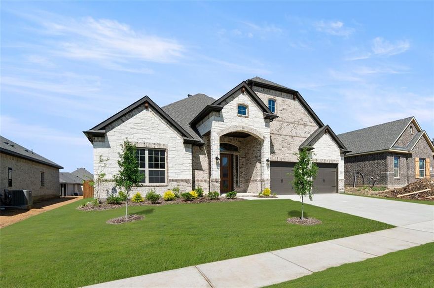 If you’ve been searching for a new build in Waxahachie with space, modern design, and a great location, this one checks all the boxes. With 2,603 square feet, this 4-bedroom, 3-bath home was thoughtfully designed for modern living—open, bright, and easy to settle into from day one.

The open-concept kitchen and living area is the heart of the home, featuring a gas cooktop, generous workspace, and a cozy gas fireplace that brings everyone together for relaxed evenings or weekend gatherings. Natural light fills the space, and the neutral finishes make it simple to add your own style.

The primary suite feels like a true retreat, complete with a spa-inspired bathroom and a large walk-in closet that actually keeps you organized. Three additional bedrooms and two full baths give you flexibility for guests, a home office, or space to grow.

Step outside to the covered patio, perfect for morning coffee or winding down at the end of the day. A two-car garage adds everyday convenience.

Located just minutes from 35E and US 287, this home offers an easy commute while still delivering the charm and comfort for which Waxahachie is known.