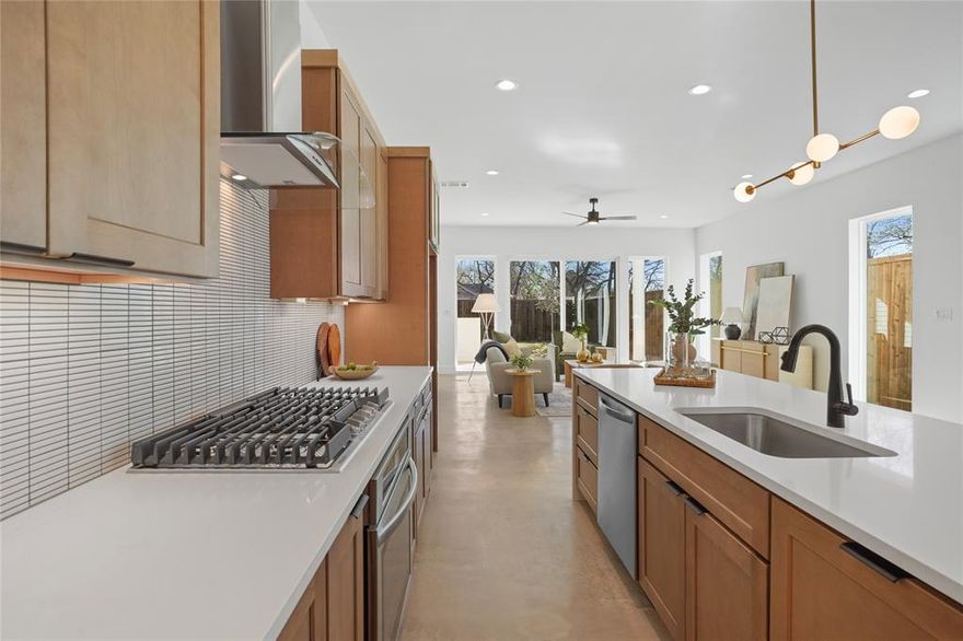 Live in style at 5308 Terry Street, a sleek, light-filled modern home tucked into one of Dallas’s most vibrant and connected neighborhoods. Just steps from the Santa Fe Trail, Tenison Park Golf Course, and minutes from Deep Ellum, Lower Greenville, and White Rock Lake, this home offers the perfect balance of urban energy and outdoor ease.

Inside, you'll find 3 spacious bedrooms, 2 full bathrooms, half bath, and over 2,000 square feet of thoughtfully designed space. The open-concept layout features clean architectural lines, high ceilings, and modern finishes throughout. The kitchen is a standout, featuring stainless steel appliances, quartz countertops, a massive pantry, and seamless flow into the main living area, ideal for both entertaining and everyday life.

Each bedroom includes a walk-in closet, with ample storage and private space to unwind. The backyard provides a private escape, perfect for quiet mornings, weekend grilling, or a little outdoor breathing room.

This is elevated East Dallas living, refined, connected, and move-in ready!