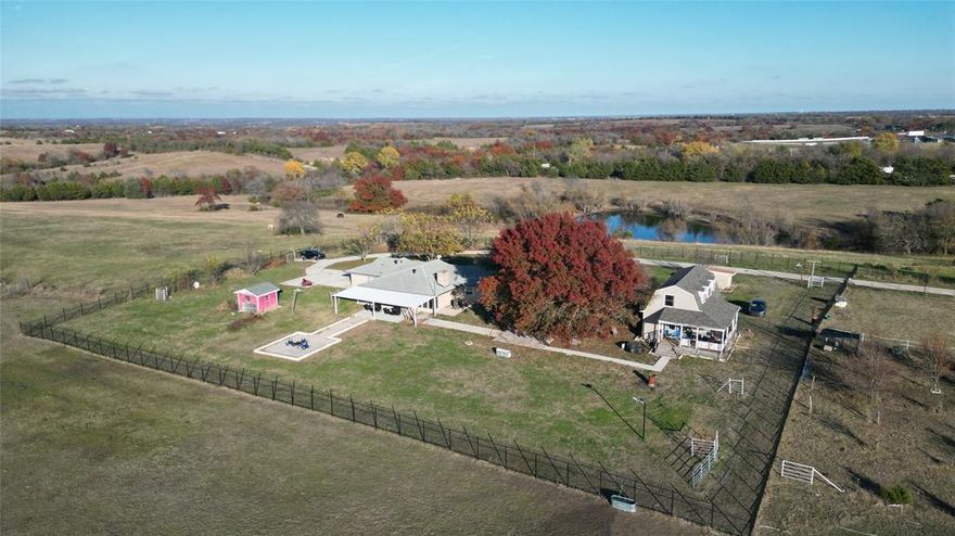 OWNER FINANCING AVAILABLE. Breathtaking views from one of the highest points in Grayson County! There is NO flood zone on the property. There are 2 houses on this property; details below. This exceptional property is perfect for weekend retreats, your future dream home, or an incredible investment opportunity. With stunning evening sunsets, a small lake for fishing and paddle boating, and multiple producing pecan and fruit trees, this property offers both beauty and functionality. 
The main house (2500 Sqft) features 4 bedrooms, 3 full bathrooms, a game room, a formal dining area, and a recently remodeled kitchen—ideal for comfortable living or entertaining. Additionally, there’s a guest house (1500 Sqft) with 2 bedrooms, 2 full bathrooms, a spacious living room, and a large kitchen with ample storage and counter space. (The property is currently rented).
For ranch enthusiasts or agricultural use, the property includes:
• A large metal barn-workshop for storing equipment or ATVs
• A cow barn, catch pen, and loading chute
• Cross-fencing for livestock management
• A storage shed for added convenience
Location Highlights
• Opposite Grayson County Speedway and adjacent to Willowood Ranch & Chapel (300+ acres).
• Just a 15-minute drive to Sherman, TX, home to $29 billion investment from Texas Instruments and $5 billion from GlobalWafers 
Potential Uses
This versatile property offers endless possibilities:
• Ranch or horse property
• Residential subdivision (utilities available to serve up to 70 lots)
• RV park or Airbnb vacation rental opportunities
• Event venue for weddings or retreats