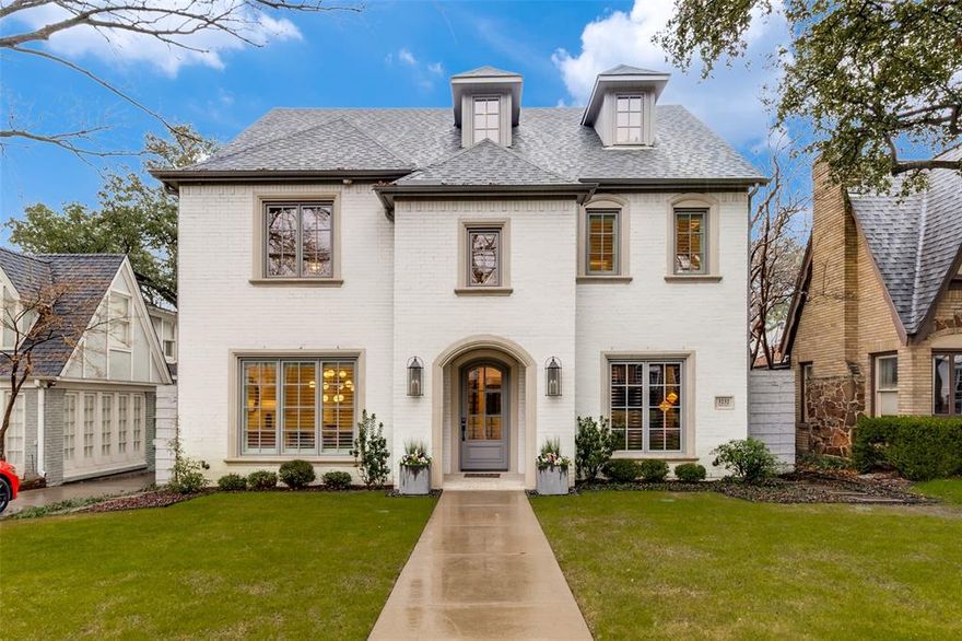 Don't miss this timeless five bedroom University Park home in the Highland Park School district. This classic home was built by Canterbury Homes in 2020 and featured high end finishes and high ceilings throughout. Each of the five bedrooms has an en suite bathroom, and there is a powder bath on the first floor. The gorgeous chefs kitchen opens to the family room and features an oversized marble island and breakfast bar as well as the adjacent breakfast room. Additionally, this home features a formal dining room and study on the first floor as well as a built in desk area off of the mudroom and two car attached garage. Upstairs you will find 4 bedrooms with en suite bathrooms,  the utility room and the large game room. The primary bathroom boasts dual vanities, separate soaking tub, warming drawer and massive walk in closet. The third floor is home to an oversized bedroom with a full bathroom, closet and an abundance of storage in the attic areas. This space could also be used as an additional bonus space, exercise room or office. The private backyard featured a spacious covered patio, a pool and turf yard space. Walk to all that Snider Plaza has to offer, SMU, several parks and much more!