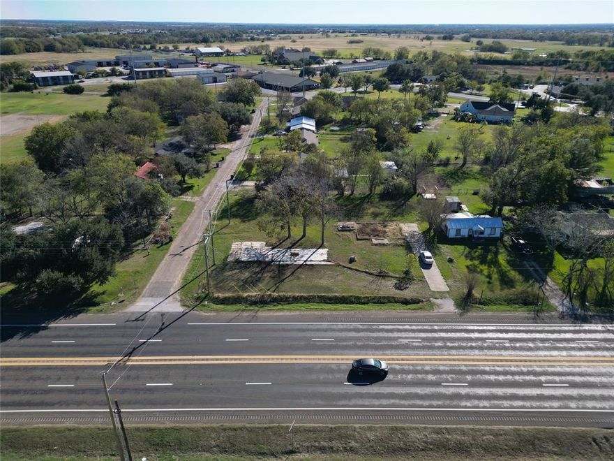 Discover an exceptional commercial opportunity in Wills Point, designated the Bluebird Capital of Texas. This 0.52-acre parcel is zoned for commercial use and offers a prime location with direct frontage on U.S. Highway 80, ensuring high visibility and accessibility. The area holds many events with your new space benefitting from direct traffic along Highway 80, including Wills Point’s annual festivals, the renowned annual Highway 80 public sale, and Canton’s monthly First Monday Trade Days. Located about an hour east of Dallas, this property provides convenient access to the city's amenities while benefiting from the charm of a growing community. Wills Point boasts a rich history and a supportive business environment, making it an ideal setting for your next venture. Whether you're planning to establish a retail space, office space, or service establishment, this strategically located lot offers the perfect foundation for success.