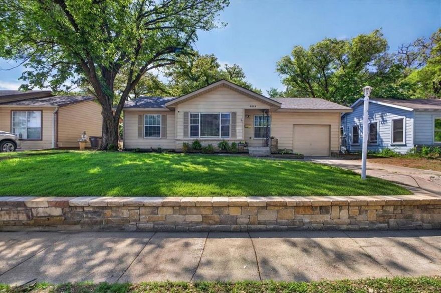 Welcome to 6828 Greenlee Street, Fort Worth, TX! This charming 3 bedroom, 2 bathroom home offers the perfect blend of comfort, style and modernized updates. As you enter, you’re greeted by a bright and spacious living area filled with natural light, ideal for relaxing or entertaining. The open-concept layout flows seamlessly into the dining area and modern kitchen with ample cabinetry, gas stove top, lots of counter space and open to the eat in bar. The home features all-new luxury vinyl plank flooring throughout, fresh paint, and new light fixtures. The primary bedroom is a true retreat with its beautiful beamed ceiling and private ensuite bathroom, complete with a stylish vanity, gold hardware, sleek fixtures, new tub & tiles. A huge flex room could be used as a game or media room offers incredible versatility and it could easily become a large dining room, home office, or additional living space. On the front of the home, two generously sized bedrooms with nice size closets. Additional highlights include a large utility room with extra storage and shelving (that stays), plus a second full bathroom featuring custom tile flooring, a new bathtub with a beautiful backsplash, a new vanity, and a mirror with built-in shelves. Outside, the backyard is a private oasis with a deck right off the back door and a concrete pad perfect for sports, a workshop, or a future shed. NEW ROOF with warranty! This space is ready for your personal touch. Located in a vibrant Fort Worth neighborhood, this home provides easy access to shopping, dining, entertainment, and major roadways.