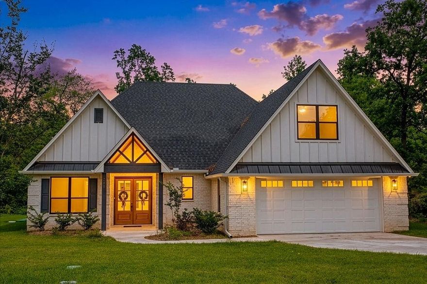 Welcome to your brand-new home in the gated Hideaway Lake community—where everyday living feels a little more relaxed and a lot more beautiful. This thoughtfully designed 4-bedroom, 3-bath home was built with both style and function in mind, offering clean finishes, open spaces, and plenty of natural light throughout that makes every room feel warm and inviting. As you walk in, you’re greeted by an open layout, a gorgeous brick floor to ceiling wood-burning fireplace, wood beamed vaulted ceilings, with large sliding glass doors that lead out to a quiet backyard—ready for whatever you have in mind, whether that’s a patio setup, fire pit, or garden space. The patio cover has a stunning bead-board finish. This setting overlooks a tranquil creek located at the back of the property. The kitchen really stands out with white cabinetry, quartz countertops, a striking backsplash, gold hardware, an oversized farmhouse sink, and a walk-in pantry with tons of storage. The primary suite feels like its own private escape, with double doors leading to the patio and a spacious bathroom featuring a soaking tub, walk-in shower, and a closet that connects directly to the laundry room (a detail you’ll appreciate daily). Downstairs, there’s also a beautiful office with a striking blue accent wall and detailed trim—could also serve as a fourth bedroom, game room or library. Upstairs, you’ll find two additional bedrooms and a full bath—perfect for guests, kids, or even a home office setup. Hideaway offers a resort-style living with a Clubhouse, 24-7 security, 3 private lakes, 27-holes of golf, community pool and beach, tennis and pickleball courts, and multiple parks. Hideaway is in Lindale ISD, considered one of the best school districts in Texas.