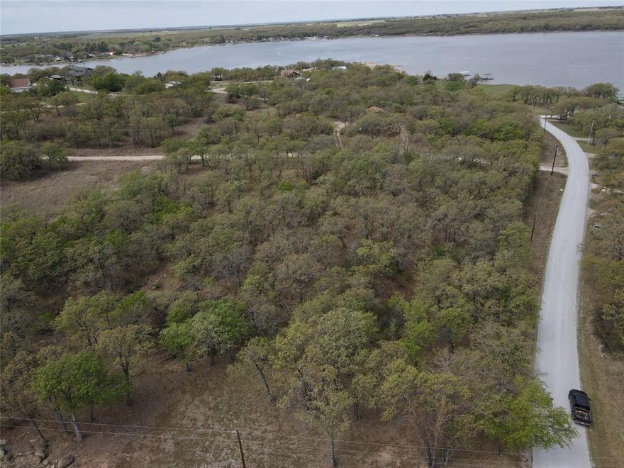 Some properties are about what’s there today—others are about where they’re headed. This one offers both. Located in Nocona Hills along Lake Nocona, this unimproved lot sits within a community that’s evolving in all the right ways.

Per HOA-provided information, water service is sourced from the Trinity Aquifer and managed through a non-profit corporation governed by property owners. Water lines have been installed throughout the development to serve homesites—an important piece of long-term planning that continues to support growth.

The lifestyle here is what continues to draw attention:
• Private lake access• Private golf course• 24-hour guarded entry• 3,000-ft landing strip with hangar sites• RV and camping areas• Volunteer fire department and community church

With the clubhouse currently undergoing significant renovations—including plans for dining and gathering space—the trajectory here is clear, while still maintaining the laid-back feel that defines the community.

It’s a smart play for today, with an eye on what’s ahead.