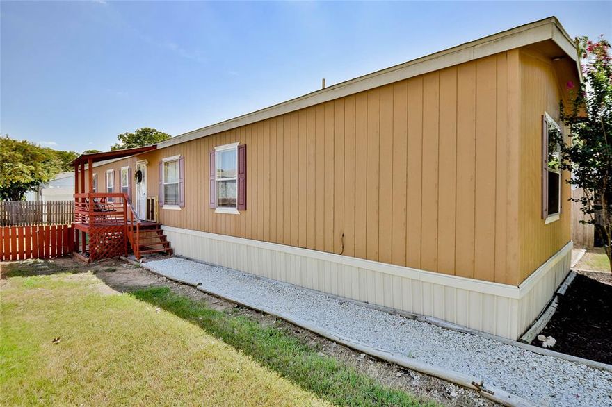 Welcome to 6631 Dayla Court, a clean, well-maintained, and recently retrofitted manufactured home located on the Fort Worth side of Granbury in a Lake Granbury community—offering affordability, convenience, and lifestyle value in one package.  This home has been professionally retrofitted, meaning it qualifies for traditional financing, making ownership more accessible than many manufactured homes. Even better, the home is truly move-in ready and comes fully equipped with the refrigerator, washer, and dryer, saving buyers immediate out-of-pocket expenses.  Inside, you’ll find a bright, clean interior that has been well cared for—ideal for buyers who want a home that feels comfortable, fresh, and ready from day one. The layout is practical and efficient, making excellent use of space for everyday living, whether you’re downsizing, buying your first home, or looking for a low-maintenance option near the lake.  The neighborhood offers access to Lake Granbury, giving you the opportunity to enjoy fishing, boating, and relaxed lakeside living—without paying lakefront prices. Conveniently located on the Fort Worth side of town, this home provides easier commuting, quick access to shopping, dining, and medical services, and a smoother drive toward Fort Worth and surrounding areas.  If you’ve been searching for an affordable home near the lake that actually qualifies for a loan, this is one you need to see!
