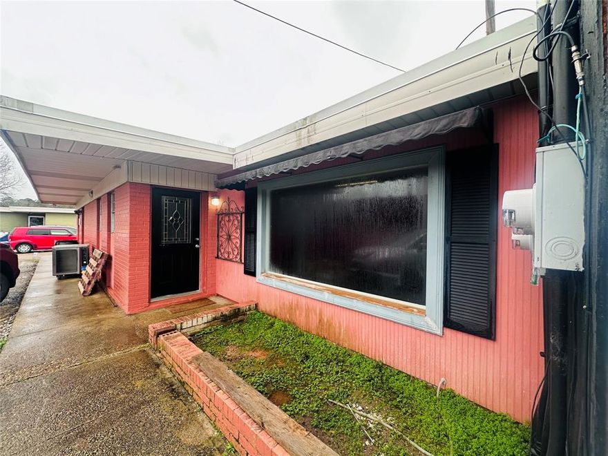 This commercial lease offers a prime location in a red building situated behind the front building on Mansfield Rd., directly across from Lowe's. It provides an excellent spot for any business or service-oriented company. The space includes a bathroom, plenty of room, and is move-in ready. Formerly an engineering lab and office, it is adaptable for mixed-use or office purposes. Convenient parking spaces are located right next to the building, making it easy for clients and employees to access. Perfect for a variety of business needs!