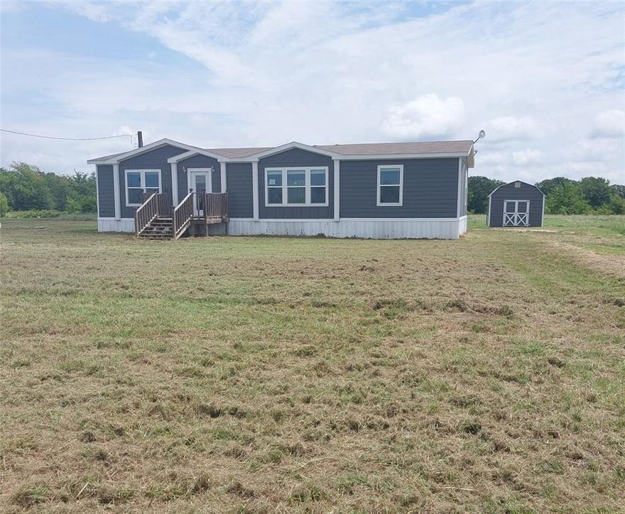 Great location just off FM 195 in North Lamar ISD. Great 3 bedroom 2 bath home sitting on 1.24 acres of land. Nice storage shed and pretty views of the countryside. The interior features a large open living room with built in bookshelves, Split bedroom floor plan with a large primary suite with updated bathroom, large walk in shower and walk in closet. This home has a lot to offer and will not last long at this price. Come take a look today before it is gone! Sold AS-IS.