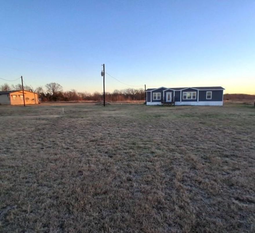 Great location just off FM 195 in North Lamar ISD. Great 3 bedroom 2 bath home sitting on 1.24 acres of land. Nice storage shed and pretty views of the countryside. The interior features a large open living room with built in bookshelves, Split bedroom floor plan with a large primary suite with updated bathroom, large walk in shower and walk in closet. This home has a lot to offer and will not last long at this price. Come take a look today before it is gone! Sold AS-IS.