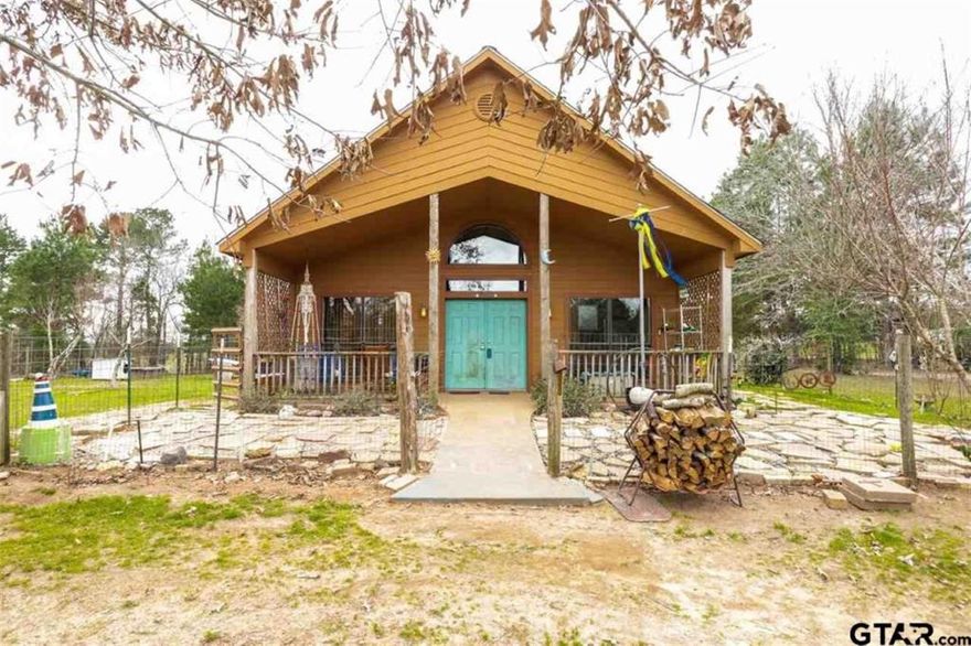 Approximately 6.620 lovely acres with home, shop and barn nestled in the trees.  If you want country living and peace and quiet this place is for you!  Lovely homes in the area that are well taken care of.  Neighbors takes pride in their land and home place.  This home features 3 nice size bedrooms with two baths downstairs, a laundry room, pantry, kitchen, dining, and living.  Upstairs you will find a half bath and a large bonus room which could be a media room, gameroom or 4th bedroom.  Solar Panel will be paid off at Closing!

There is a 50 amp breaker and new pole for RV in place for your RV parking.  Covered 2 car carport.