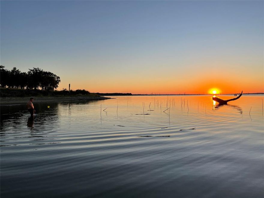 Welcome to Lot 52 in Admiral Shores located on Richland Chambers Lake, the third largest lake in Texas. Nestled on a quiet cul de sac this 1.435 acre lot has stunning open water views to bring your dream home to life. Bring your house plans and start building that dream home on the lake. Imagine a night spent by your fire pit with your family making life long lasting memories. Nature lovers will appreciate the shade throughout the property. This wonderful lot features 599 feet of waterfront living in a protected cove to provide peace and serenity. The community amenities include a private marina for owners and a small park with picnic tables and a small beach area for your family to enjoy the water or build yourself a beautiful boat house on your property for easy access. Admiral Shores is a gated community that provides safety and security. Private Paved Road are a huge asset to this property. Breathtaking sunrises and sunsets over the lake.  Imagine life on the lake with swimming, boating, fishing or relaxing. Take full advantage of all that lakeside living has to offer!