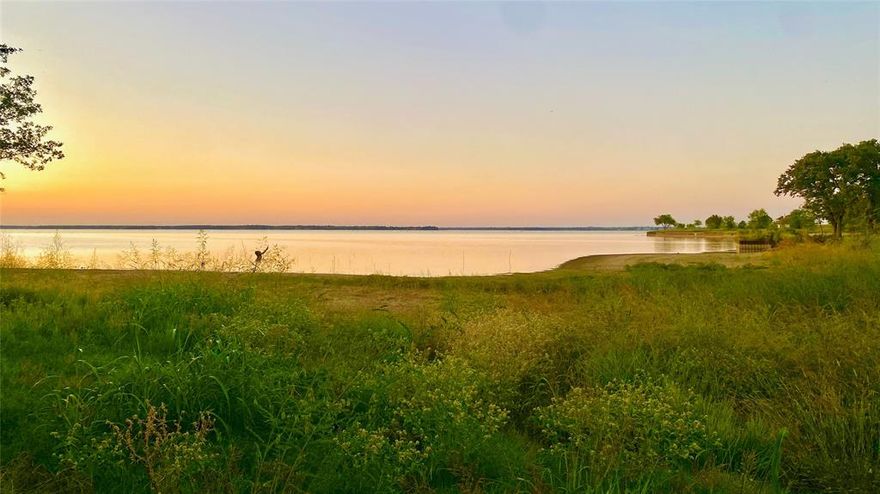 Welcome to Lot 52 in Admiral Shores located on Richland Chambers Lake, the third largest lake in Texas. Nestled on a quiet cul de sac this 1.435 acre lot has stunning open water views to bring your dream home to life. Bring your house plans and start building that dream home on the lake. Imagine a night spent by your fire pit with your family making life long lasting memories. Nature lovers will appreciate the shade throughout the property. This wonderful lot features 599 feet of waterfront living in a protected cove to provide peace and serenity. The community amenities include a private marina for owners and a small park with picnic tables and a small beach area for your family to enjoy the water or build yourself a beautiful boat house on your property for easy access. Admiral Shores is a gated community that provides safety and security. Private Paved Road are a huge asset to this property. Breathtaking sunrises and sunsets over the lake.  Imagine life on the lake with swimming, boating, fishing or relaxing. Take full advantage of all that lakeside living has to offer!