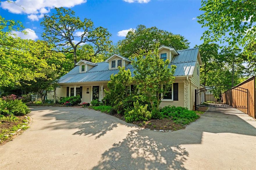 OPEN HOUSE, SUNDAY - APRIL 12TH, 1-3  Charming 1950s Home—Thoughtfully Updated with Modern Comfort & Multigenerational Flexibility.

Step into the perfect blend of timeless character and modern living in this beautifully updated 1950s home, fully renovated in 2000. Down stairs primary bath, renovated in 2015. Offering exceptional space and versatility, this property features four bedrooms, a dedicated office, with THREE of the bedrooms as primary suites—ideal for multigenerational living or hosting guests with ease.

Inside, you’ll find extra-large rooms, abundant storage, and large closets throughout. The kitchen is both functional and stylish, complete with glass block windows for natural light and privacy, an appliance garage, and a center island, plus a convenient buffet counter in the dining area. Unique architectural details like additional glass block windows in the north hall enhance both light and privacy.

The home is designed for comfort and accessibility, featuring wide 3-ft doorways, lever-style handles, no carpet, a no-step entry, and a walk-in shower with built-in seat and hand wand.

Outside, enjoy a true gardener’s paradise. The lush yard features 8 Japanese maples, mature landscaping, and vibrant azaleas in pink, red, and white, creating a serene, ever-blooming setting. A dedicated “cutting garden” offers the joy of sharing fresh flowers with friends and neighbors. Sandy loam soil and a 12-zone sprinkler system make gardening effortless.

Additional highlights include,

3 HVAC zones for energy efficiency and comfort,
Surge protector on electrical system,
Smart garage door opener (phone-controlled),
Detached garage with 16-ft workshop space,
Circle drive with easy front door access and minimal step,
Functional under-stair storage,
Mail delivery to the front door,

Conveniently located with quick access to I-30, putting both Dallas and Fort Worth just 20 minutes away.