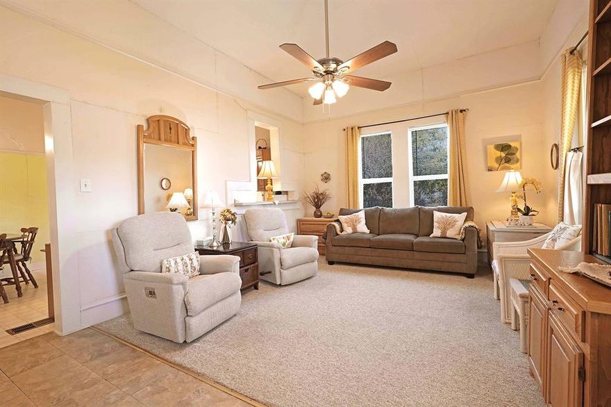 Use of Preferred  Lender will offer to pay .75 points of buyer’s closing costs. Call TODAY to see if you Qualify! 
Discover this charming 3-bedroom, 1.5-bathroom home with an additional storage building, nestled in the heart of historical Downtown Krum. Conveniently located on a corner street directly across from Hattie Dyer Elementary, this delightful residence blends enchanting original elements with modern updates. Enjoy updated windows that flood the space with natural light, along with updated kitchen cabinets for ease of use and mature landscaping that adds to the curb appeal charm.The home features three generously sized bedrooms with closets, high ceilings, and 1.5 baths for easy morning routines. A full-size laundry room provides access to the backyard, while the cozy living room invites you to relax and unwind. The kitchen serves as the heart of the home, offering ample storage and space for a full-size kitchen table, making entertaining a breeze. Whether hosting a crowd or just a few guests, there is plenty of room for everyone. Additionally, a storage building on the property enhances the home's functionality by providing extra space for your storage needs. This property is being sold as-is, presenting a unique opportunity to make it your own in a prime location.