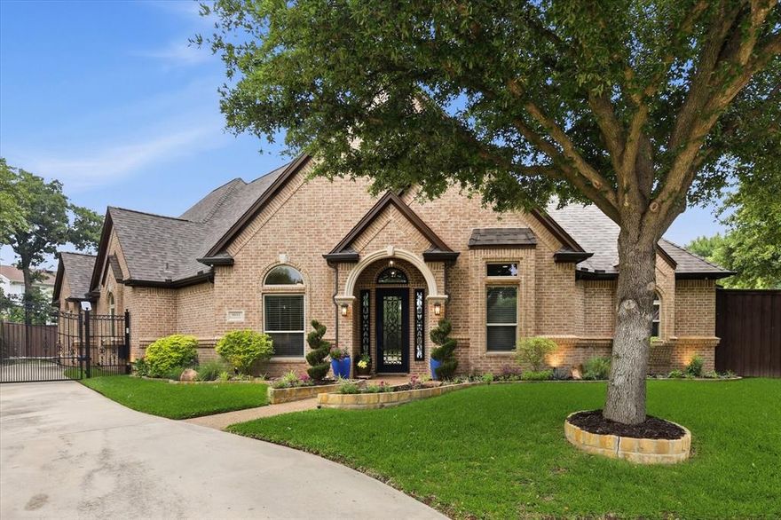 Nestled on an oversized cul-de-sac lot, this beautifully updated 4-bedroom, 4-bath residence offers an exceptional blend of comfort, functionality, and thoughtful design. All bedrooms are conveniently located on the main level, while an expansive upstairs gameroom with a full bath opens to a private balcony with exterior stairs leading to the covered patio—creating a seamless indoor-outdoor living experience ideal for entertaining. The open-concept layout is both inviting and practical, anchored by a spacious chef’s kitchen featuring a large island with prep sink, abundant cabinetry, a butler’s pantry, appliance garage, and exceptional storage. Extensively upgraded with over $300,000 in improvements, the home showcases a comprehensive interior renovation with updated baths, all-new flooring, granite surfaces, and refined fixtures. The kitchen is further elevated by a premium Thermador appliance suite, including a steam oven and warming drawer. Major system upgrades include Pella windows installed throughout, three HVAC systems replaced and maintained under service contract, and a recently completed roof and gutter replacement (2026). The attic has been upgraded with approximately 16 inches of insulation, meeting today’s standards for energy performance. Step outside to a private backyard oasis backing to scenic walking, jogging, and biking trails, with nearby parks for added enjoyment. The outdoor living space features a heated and chilled pool with spa, a spacious side yard, privacy fencing, and a pollinator garden that attracts birds and hummingbirds. A complete pool remodel and newer pump enhance both beauty and function. Additional highlights include a three-car oversized garage with finished floors and a peaceful neighborhood setting. Ideally located near Sandlin City Park, offering trails, playgrounds, and greenbelt access—this is a rare opportunity to own a truly turnkey home in a desirable community.