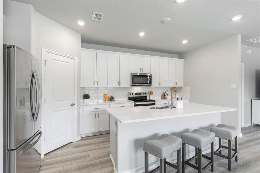 At 1504 Cobblestone Road in Melissa, this 2023 energy-efficient home delivers the space, flexibility, and everyday setting many buyers hope to find but rarely see all in one place. Set on a spacious interior corner lot across from the neighborhood pond, playground, and walking trails, the location adds a sense of openness and an easy connection to the outdoors from the moment you arrive. Inside, the floor plan fits the way people live today, with a first-floor flex room near the entry that works beautifully as a home office, playroom, or quiet study. The open-concept living and dining areas connect seamlessly to the eat-in kitchen, where a large island, stainless steel appliances, abundant cabinetry, and generous prep space create a natural hub for busy mornings, casual dinners, and gatherings with friends. Privately tucked away on the first floor, the primary suite offers separation from the upstairs living spaces and a more restful retreat at the end of the day, complete with a spacious bath and oversized walk-in closet. Upstairs, 3 additional bedrooms, a full bath, a large game room, and an open bonus room give buyers the flexibility they want for movie nights, homework, hobbies, exercise, guests, or a second living area. Outside, the covered patio overlooks a large fenced backyard with plenty of room to play, garden, entertain, or even design the pool you have been dreaming about. The west-facing orientation brings soft morning light into the backyard and colorful Texas sunsets out front. With quick access to Hwy 75 and an easy drive to McKinney, Allen, and Frisco, plus close proximity to H-E-B, Buc-ee’s, shopping, dining, and entertainment, this home pairs newer construction with the kind of layout, yard, and neighborhood setting that feels easy to picture as home from the start.